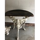 A 19thC cast iron table with wooden top a/f.