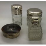 Three silver topped jars with a silver and tortoiseshell piqué box. 6cms d.