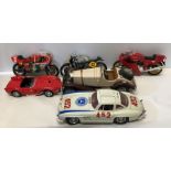 Three model Burago cars including Mercedes 300 SL 1954, Ferrari 250 Testa Rossa, Mercedes Benz SSK