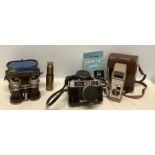 Cameras etc to include a vintage brass pocket telescope, cased binoculars, a Ricoh cased camera