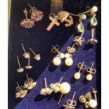 Nine pairs of earrings set with pearl, opal, pink and blue stones and with mainly 9ct gold backs and