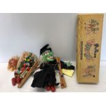 Two 1950's Pelham Puppets in box .A Witch and a young girl. Condition ReportHead of girl loose.