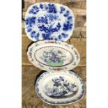Three large meat platters,the blue and white having slight crack. Largest 43 x 53cms.