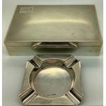 A silver engine turned cigarette box, 17 x 11 x 4cms with an engine turned silver ashtray