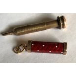 Red enamelled yellow metal cased pencil, small outer link stamped 375. approx 3cms l.