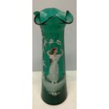 A 19thC green glass vase with Mary Gregory style decoration to front. 23cms h.