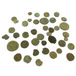 A quantity of uncleaned Roman coins.