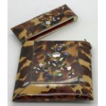 A 19thC tortoiseshell card case with shell inlay, 10 x 8cms, good condition.