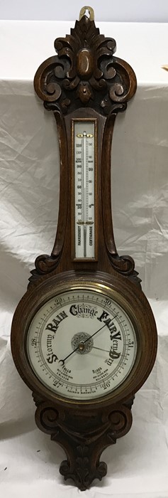 Oak cased aneroid barometer, 90cms h.