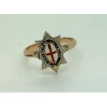 A 9ct gold and enamel Order of the Garter ring. 3gms. Condition ReportEnamel a/f. 3gms.