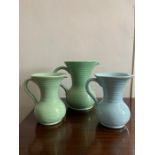 A collection of 3 Lovatts jugs and a large Wedgwood jug.22cms h.