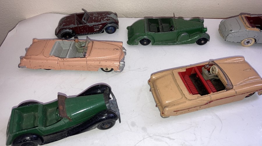 A large collection of playworn Dinky convertible cars to include Jaguar, Armstrong Siddelet, Sunbeam - Image 4 of 17