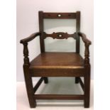 A 19thC mahogany child's chair, height to seat 27cms h, 35.5cms w, small repair to one arm.