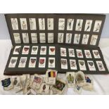 A large quantity of cigarette cards including 2 books with Will's Arms of the British Empire, (50)