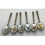 Six silver and floral enamel teaspoons, Birmingham 1966, good condition together with 6 silver