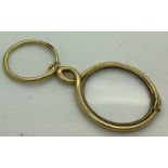A magnifying glass formed of two serpents, tests as 14/15ct gold. 15.1 gms total. 7cms l.