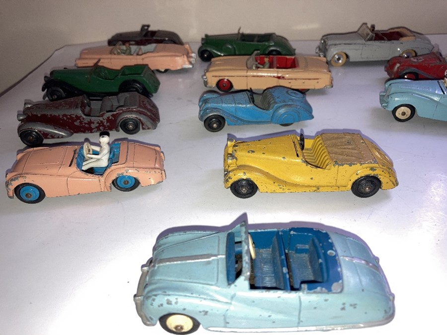 A large collection of playworn Dinky convertible cars to include Jaguar, Armstrong Siddelet, Sunbeam - Image 12 of 17