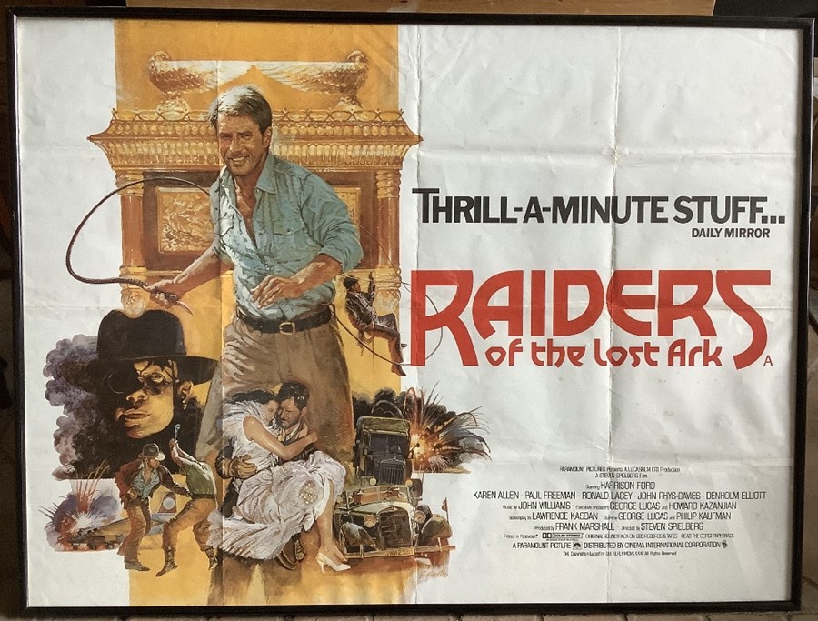 Framed film poster, RAIDERS OF THE LOST ARK, Harrison Ford, Paramount Pictures 1981. 75 h x 100cms