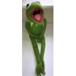 A 1980's Fisher-price Kermit the Frog Toy. Condition ReportGood condition overall, few holes to