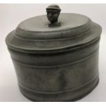 Early 19thC pewter lidded tobacco jar with lead disc to interior with indistinct makers mark and