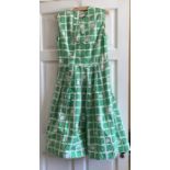 A 1950's Rodney dress labelled 14, good condition generally but some small brown marks in places