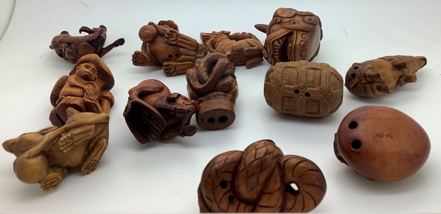 Twenty eight various modern Chinese wood and tagua nut and resin netsukes. Condition ReportTwo - Image 2 of 6