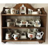 Twenty four various items crested ware including Withernsea, Scarborough etc to include oak wall