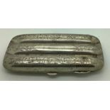 Silver cigar case to hold three cigars, foliate engraving and vacant cartouche. 92.2gms,