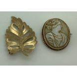 A 9ct gold brooch in the form of a leaf, 3.2gms with a shell cameo in 9ct gold mount. Maker, W Bros.