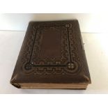 A 19thC embossed leather photograph album and contents, many interesting including cricket and mid