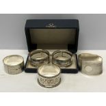 Boxed pair of Chester silver napkin rings together with 3 others, all Chester. 105gms approx.