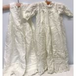 An early 20thC cotton christening gown with petticoat.