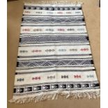 A wool and cotton Kilim in good condition. 115 x 76cms.