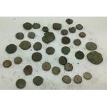 A quantity of uncleaned Roman coins.