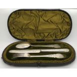 A cased silver knife, fork and spoon, 97.2gms maker James Deakin and Sons, Sheffield 1897 together