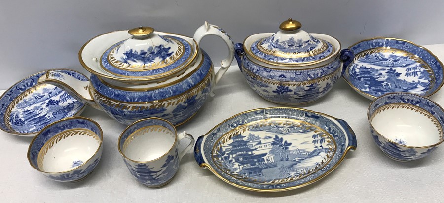 A Miles Mason porcelain part tea service, pattern 241 with pseudo seal mark, teapot a/f, sucrier top