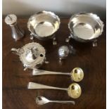 Two silver salts, Birmingham 1899, a pair of salt spoons, London 1875, two salts and a mustard pot