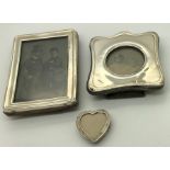 Three silver photograph frames, Chester 1905, Birmingham 1916 and Birmingham 1894. Largest 10 x