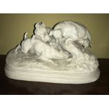 A Copeland Parian group of dogs. 33 x 19cms h.