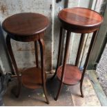 Two Edwardian mahogany and inlaid plant stands. Tallest 96 h x 34cms d.