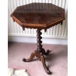 A 19thC pedestal table with barley twist pedestal and acorn finials. 55 d x 70cms h.