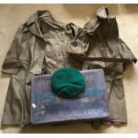 Two Military long coat Macintosh, size medium 34 inch, staining to back and a small 32 inch, dried