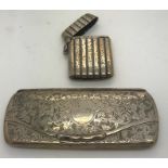 A silver spectacle case with foliate scroll decoration and vacant cartouche, Birmingham 1912