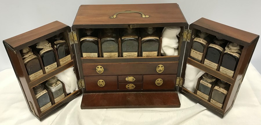 A fine quality mahogany travelling/campaign apothecary chest. Circa 1800 with bottles, pestle and