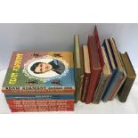 Collection of books and annuals including Victor, Valiant, Adam Adamant, The Practical Builder,