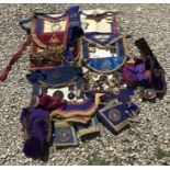 A collection of Freemason's sashes and patches, various lodges.