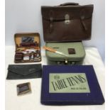 Table tennis game, leather briefcase, travel vanity set, vanity case, hosiery case.
