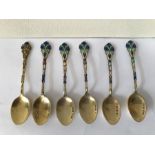 Six silver and enamel coffee spoons, Birmingham 1929. 45 gms weight. Condition ReportSome enamel a/