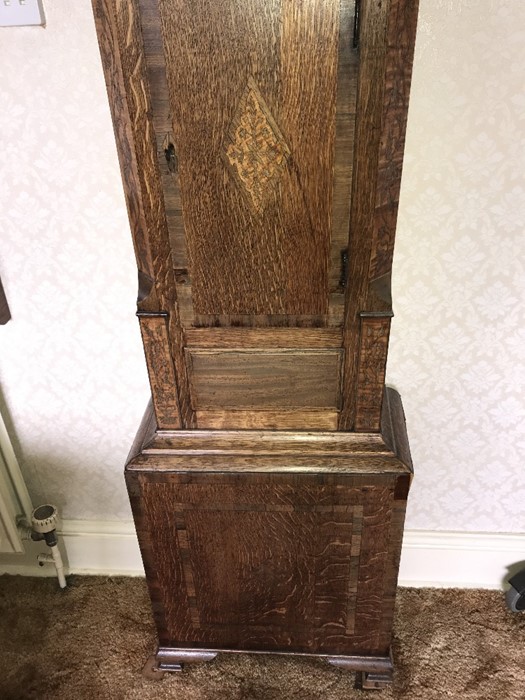 An oak and mahogany cross banded longcase clock, painted face depicting Raby Castle, Durham. - Image 7 of 7