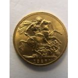 A 1927 gold sovereign.